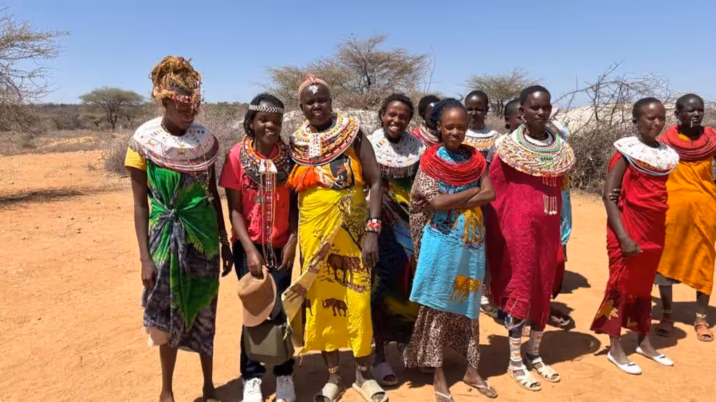 Group of Samburu people wearing traditional colorful attire and beadwork in northern Kenya