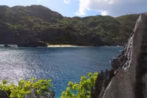 Hidden beach and limestone cliffs with turquoise water in Palawan, Philippines