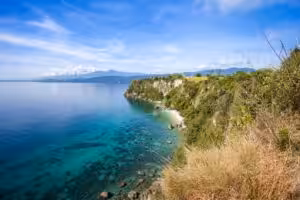 Tropical coastline with cliffs and crystal-clear turquoise water in Mindoro, Philippines