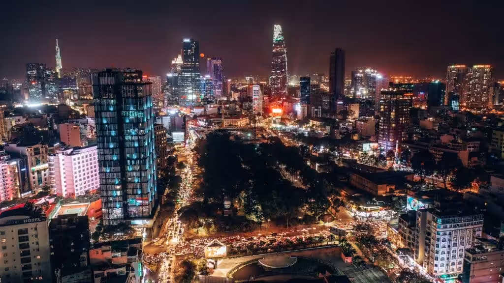 Aerial night view of Ho Chi Minh City's illuminated skyline, Vietnam